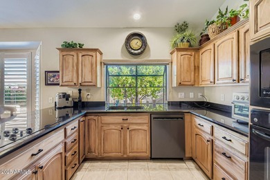 Check out this lovely expanded Hermosa plan on a cool, shady lot on Ironwood Golf Club in Arizona - for sale on GolfHomes.com, golf home, golf lot