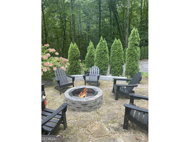 Almost brand new, beautifully updated 3-bedroom, 2-bathroom on Sky Valley Resort and Country Club in Georgia - for sale on GolfHomes.com, golf home, golf lot