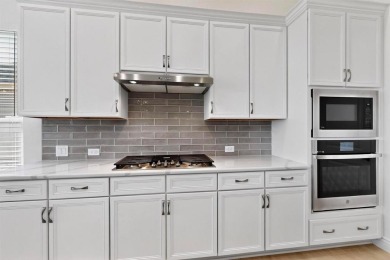 Welcome to this nearly new Larkspur home with a versatile Casita on Wildhorse Golf Club of Robson Ranch in Texas - for sale on GolfHomes.com, golf home, golf lot