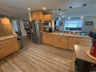 One Level Home in the Riverton Golf Course neighborhood.  This on Riverton Country Club in Wyoming - for sale on GolfHomes.com, golf home, golf lot
