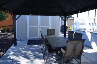 Modern living in this 2022 Cedar Creek Cottage, Destination RV on Juniper Ridge R.V. Golf Resort in Arizona - for sale on GolfHomes.com, golf home, golf lot