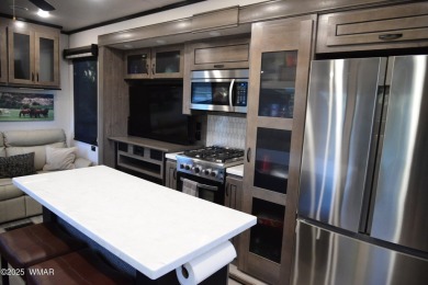 Modern living in this 2022 Cedar Creek Cottage, Destination RV on Juniper Ridge R.V. Golf Resort in Arizona - for sale on GolfHomes.com, golf home, golf lot