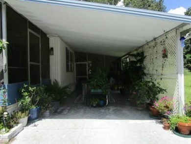 This charming 24 x 40, 2 bedrooms, 2 bath mobile home offers the on Grasslands Golf and Country Club in Florida - for sale on GolfHomes.com, golf home, golf lot