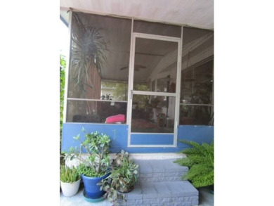 This charming 24 x 40, 2 bedrooms, 2 bath mobile home offers the on Grasslands Golf and Country Club in Florida - for sale on GolfHomes.com, golf home, golf lot