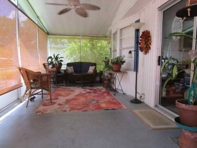 This charming 24 x 40, 2 bedrooms, 2 bath mobile home offers the on Grasslands Golf and Country Club in Florida - for sale on GolfHomes.com, golf home, golf lot