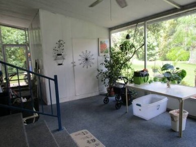 This charming 24 x 40, 2 bedrooms, 2 bath mobile home offers the on Grasslands Golf and Country Club in Florida - for sale on GolfHomes.com, golf home, golf lot