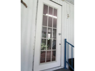 This charming 24 x 40, 2 bedrooms, 2 bath mobile home offers the on Grasslands Golf and Country Club in Florida - for sale on GolfHomes.com, golf home, golf lot