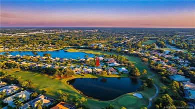 Nestled on spectaular premium lot with full lake and golf course on Willoughby Golf Club in Florida - for sale on GolfHomes.com, golf home, golf lot