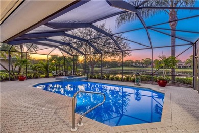 Nestled on spectaular premium lot with full lake and golf course on Willoughby Golf Club in Florida - for sale on GolfHomes.com, golf home, golf lot