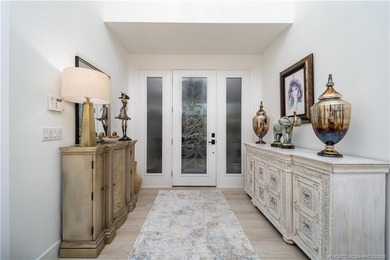 Nestled on spectaular premium lot with full lake and golf course on Willoughby Golf Club in Florida - for sale on GolfHomes.com, golf home, golf lot