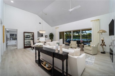 Nestled on spectaular premium lot with full lake and golf course on Willoughby Golf Club in Florida - for sale on GolfHomes.com, golf home, golf lot