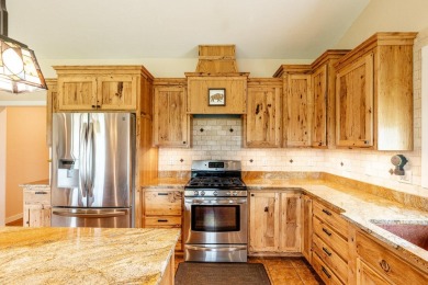 This spacious and well-appointed home located in The Powder Horn on The Powder Horn Golf Club - Mountain in Wyoming - for sale on GolfHomes.com, golf home, golf lot