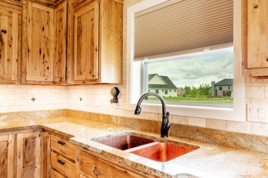 This spacious and well-appointed home located in The Powder Horn on The Powder Horn Golf Club - Mountain in Wyoming - for sale on GolfHomes.com, golf home, golf lot