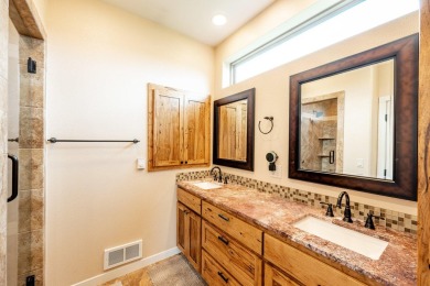 This spacious and well-appointed home located in The Powder Horn on The Powder Horn Golf Club - Mountain in Wyoming - for sale on GolfHomes.com, golf home, golf lot