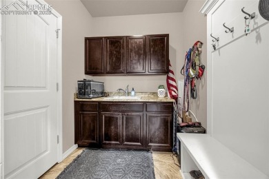 Nestled at the end of a cul-de-sac, this impressive stunning on Antler Creek Golf Course in Colorado - for sale on GolfHomes.com, golf home, golf lot