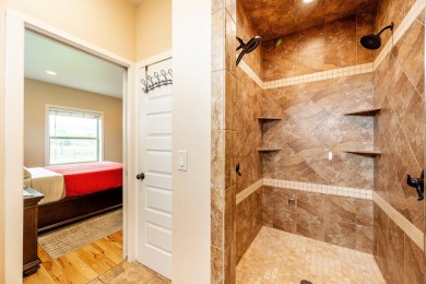 This spacious and well-appointed home located in The Powder Horn on The Powder Horn Golf Club - Mountain in Wyoming - for sale on GolfHomes.com, golf home, golf lot