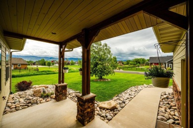 This spacious and well-appointed home located in The Powder Horn on The Powder Horn Golf Club - Mountain in Wyoming - for sale on GolfHomes.com, golf home, golf lot
