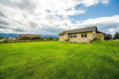 This spacious and well-appointed home located in The Powder Horn on The Powder Horn Golf Club - Mountain in Wyoming - for sale on GolfHomes.com, golf home, golf lot