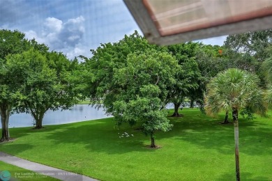 *CORNER UNIT* with a *WATER VIEW***MOTIVATED SELLER*** Parquet on Wynmoor Golf Course in Florida - for sale on GolfHomes.com, golf home, golf lot