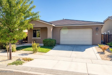 Enjoy breathtaking mountain and valley views from this on Somersett Country Club in Nevada - for sale on GolfHomes.com, golf home, golf lot