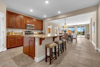 Enjoy breathtaking mountain and valley views from this on Somersett Country Club in Nevada - for sale on GolfHomes.com, golf home, golf lot