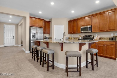Enjoy breathtaking mountain and valley views from this on Somersett Country Club in Nevada - for sale on GolfHomes.com, golf home, golf lot