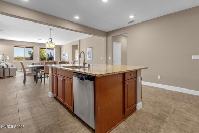 Enjoy breathtaking mountain and valley views from this on Somersett Country Club in Nevada - for sale on GolfHomes.com, golf home, golf lot