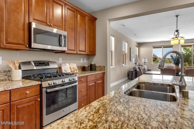 Enjoy breathtaking mountain and valley views from this on Somersett Country Club in Nevada - for sale on GolfHomes.com, golf home, golf lot