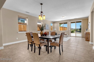 Enjoy breathtaking mountain and valley views from this on Somersett Country Club in Nevada - for sale on GolfHomes.com, golf home, golf lot