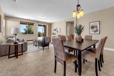 Enjoy breathtaking mountain and valley views from this on Somersett Country Club in Nevada - for sale on GolfHomes.com, golf home, golf lot