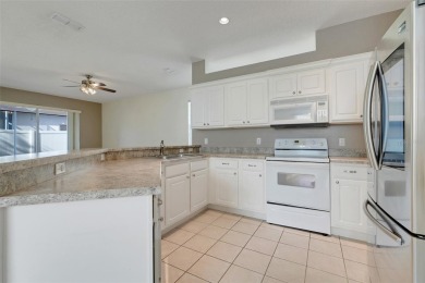 Welcome to 9081 Saint Andrews Way, a beautifully maintained home on Country Club of Mount Dora in Florida - for sale on GolfHomes.com, golf home, golf lot