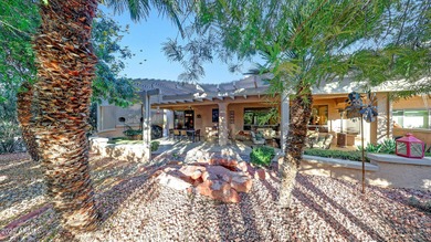 This move-in-ready home features include a stunning chef's on Sun City Grand Golf Couse and Club in Arizona - for sale on GolfHomes.com, golf home, golf lot