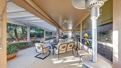 This move-in-ready home features include a stunning chef's on Sun City Grand Golf Couse and Club in Arizona - for sale on GolfHomes.com, golf home, golf lot