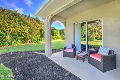 Welcome to your dream pool home nestled in the serene community on Halifax Plantation Golf Club in Florida - for sale on GolfHomes.com, golf home, golf lot