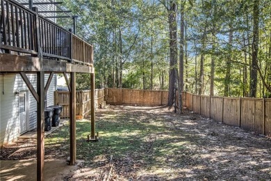 Welcome home to this charming 3-bedroom, 2.5-bath on Creekside Golf and Country Club in Georgia - for sale on GolfHomes.com, golf home, golf lot