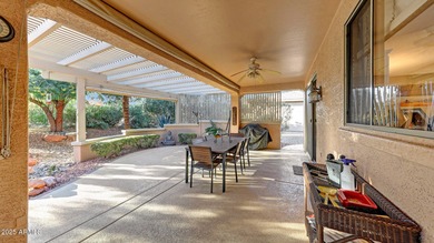 This move-in-ready home features include a stunning chef's on Sun City Grand Golf Couse and Club in Arizona - for sale on GolfHomes.com, golf home, golf lot