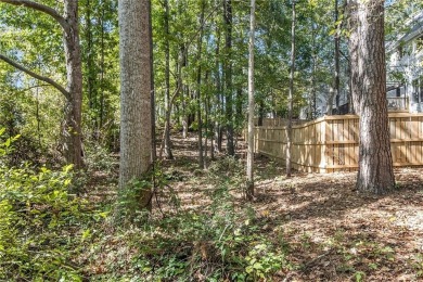 Welcome home to this charming 3-bedroom, 2.5-bath on Creekside Golf and Country Club in Georgia - for sale on GolfHomes.com, golf home, golf lot