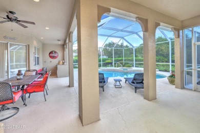 Welcome to your dream pool home nestled in the serene community on Halifax Plantation Golf Club in Florida - for sale on GolfHomes.com, golf home, golf lot