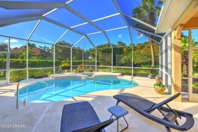 Welcome to your dream pool home nestled in the serene community on Halifax Plantation Golf Club in Florida - for sale on GolfHomes.com, golf home, golf lot