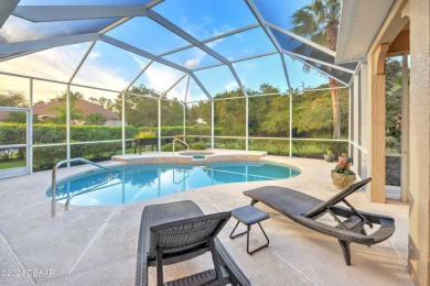 Welcome to your dream pool home nestled in the serene community on Halifax Plantation Golf Club in Florida - for sale on GolfHomes.com, golf home, golf lot