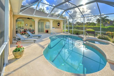 Welcome to your dream pool home nestled in the serene community on Halifax Plantation Golf Club in Florida - for sale on GolfHomes.com, golf home, golf lot