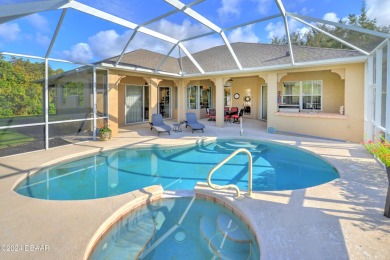 Welcome to your dream pool home nestled in the serene community on Halifax Plantation Golf Club in Florida - for sale on GolfHomes.com, golf home, golf lot