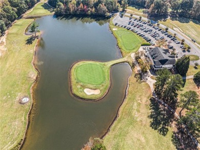 Welcome home to this charming 3-bedroom, 2.5-bath on Creekside Golf and Country Club in Georgia - for sale on GolfHomes.com, golf home, golf lot