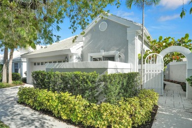 Highly sought-after single-story residence located in the quiet on PGA National Golf Club in Florida - for sale on GolfHomes.com, golf home, golf lot