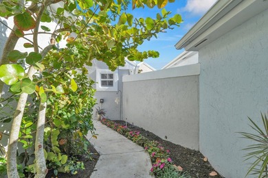 Highly sought-after single-story residence located in the quiet on PGA National Golf Club in Florida - for sale on GolfHomes.com, golf home, golf lot