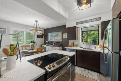 Charming and recently updated condo within walking distance of on Liberty Lake Golf Club in Washington - for sale on GolfHomes.com, golf home, golf lot