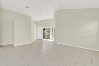 Highly sought-after single-story residence located in the quiet on PGA National Golf Club in Florida - for sale on GolfHomes.com, golf home, golf lot