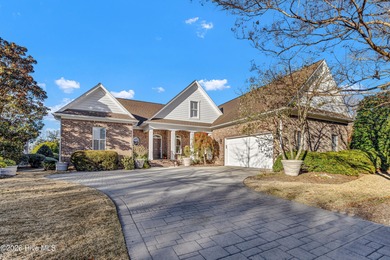 Welcome to 8948 Woodcreek Circle - where this 2006 built home on Porters Neck Country Club in North Carolina - for sale on GolfHomes.com, golf home, golf lot