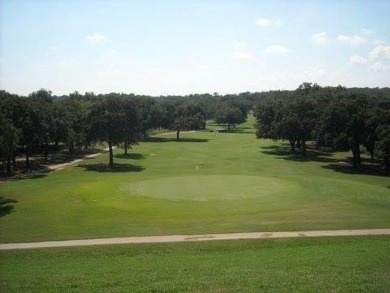 Great building site with mature shade trees, .62 of an acre on Nocona Hills Golf Course in Texas - for sale on GolfHomes.com, golf home, golf lot