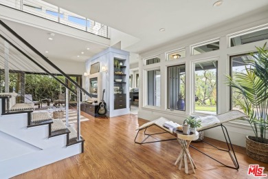 Perched above the Woodland Hills Country Club, this classic 1953 on Woodland Hills Country Club in California - for sale on GolfHomes.com, golf home, golf lot